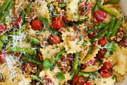 Thumbnail for Ravioli with Tomatoes, Asparagus, Garlic and Herbs