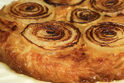 Thumbnail for Crispy Onion Skillet Cake with White Wine and Leek Cream Sauce [Video]